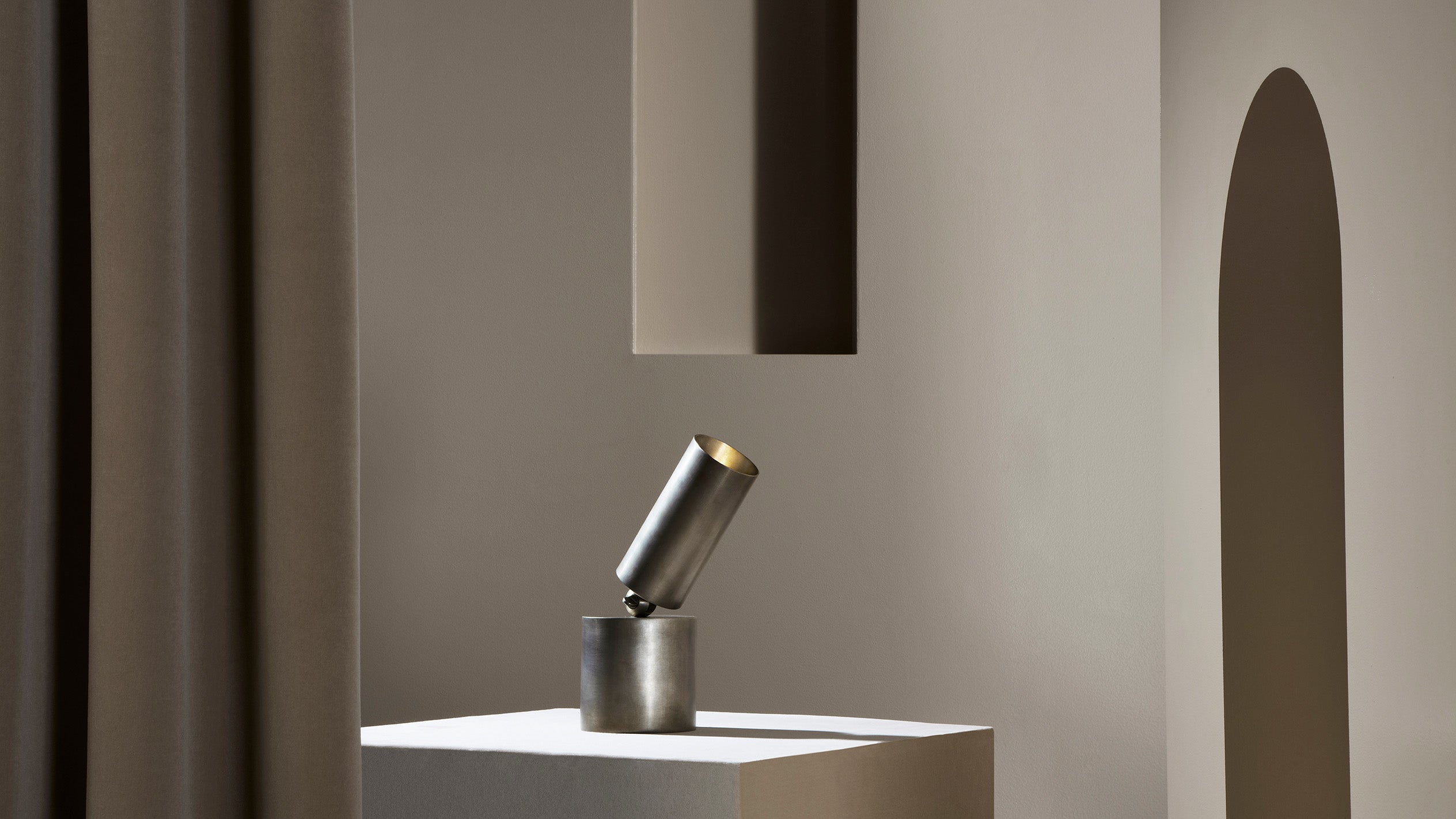 CYLINDER directional table lamp in Tarnished Silver finish. 