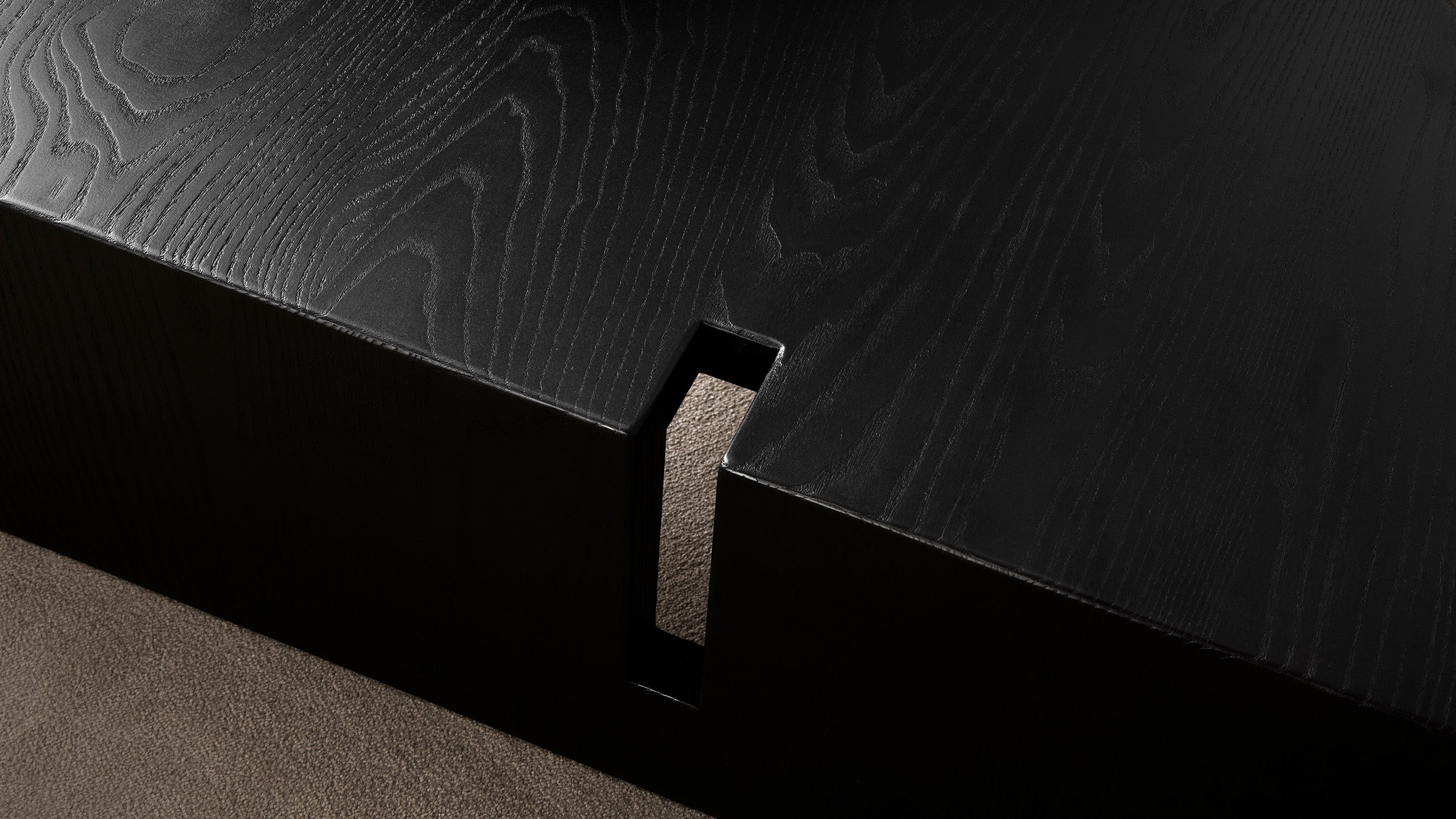 Close up of PORTAL coffee table showing details of the Blackened Ash Wood.
