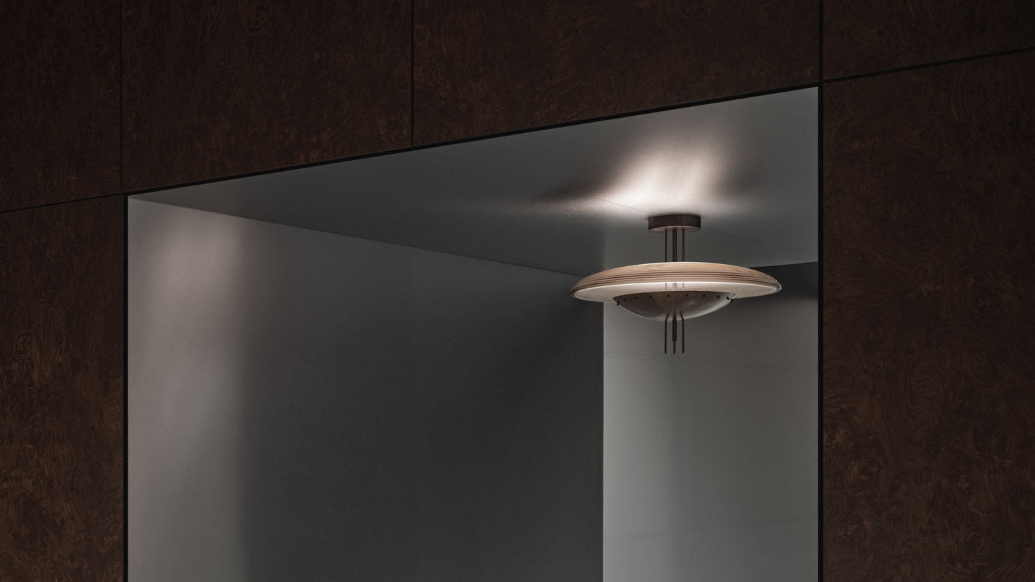 An illuminated SIGNAL : Y ceiling mounted light in Oil-Rubbed Bronze finish with Smoked Glass. 
