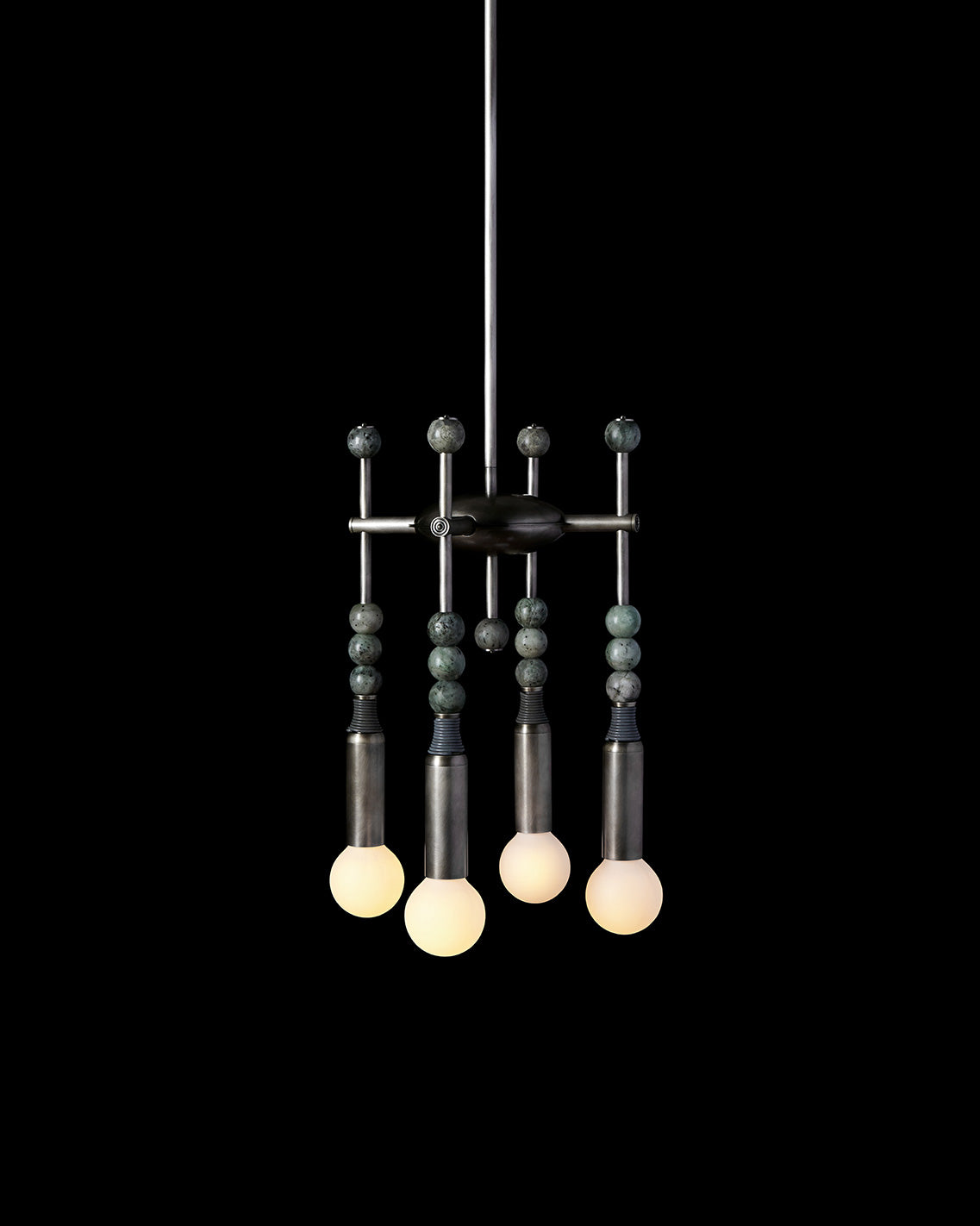 TALISMAN : 4 chandelier in Tarnished Silver and Cool Gray Leather with Jade stone, against a black background. 