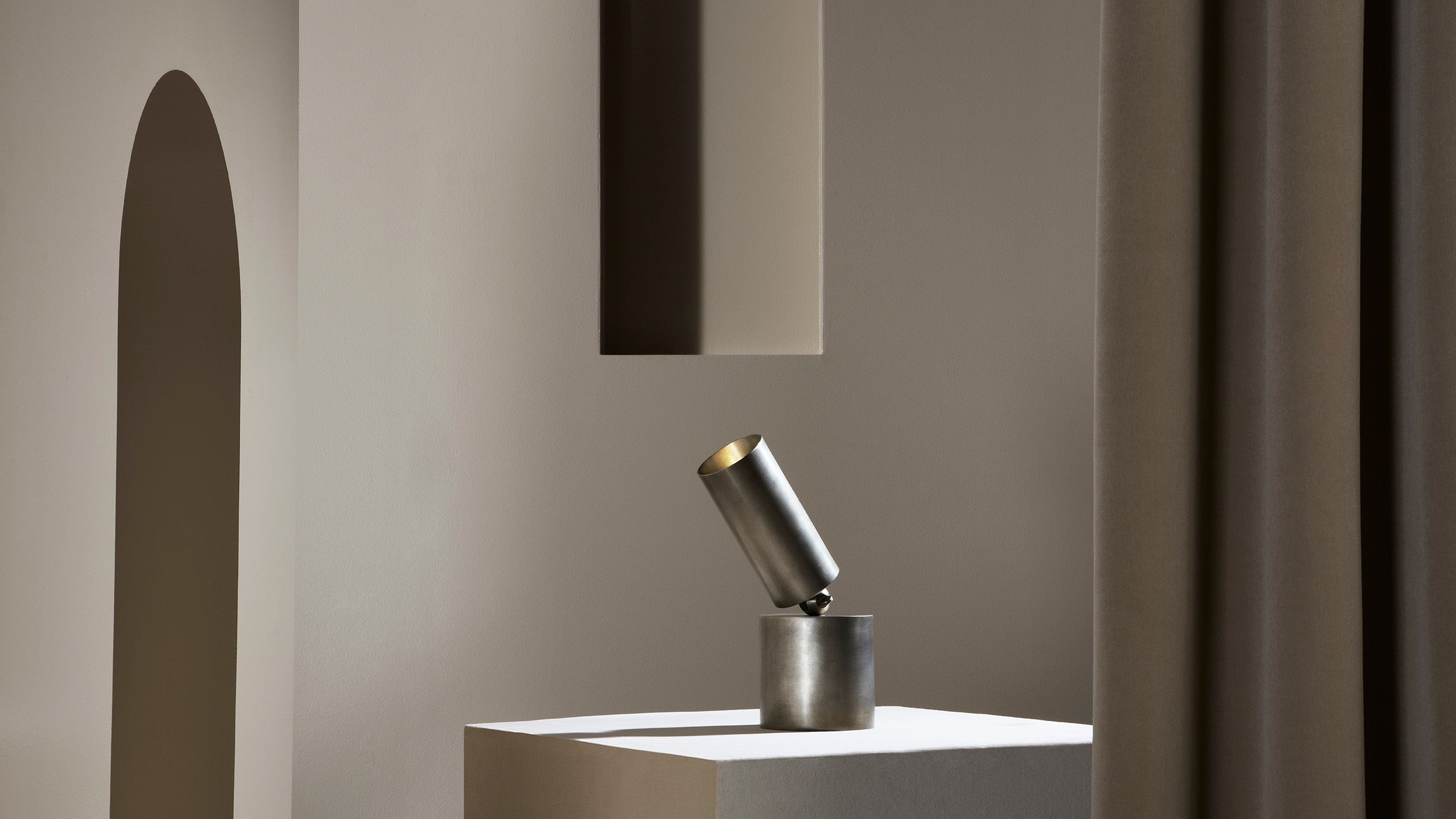 CYLINDER directional table lamp in Tarnished Silver finish. 