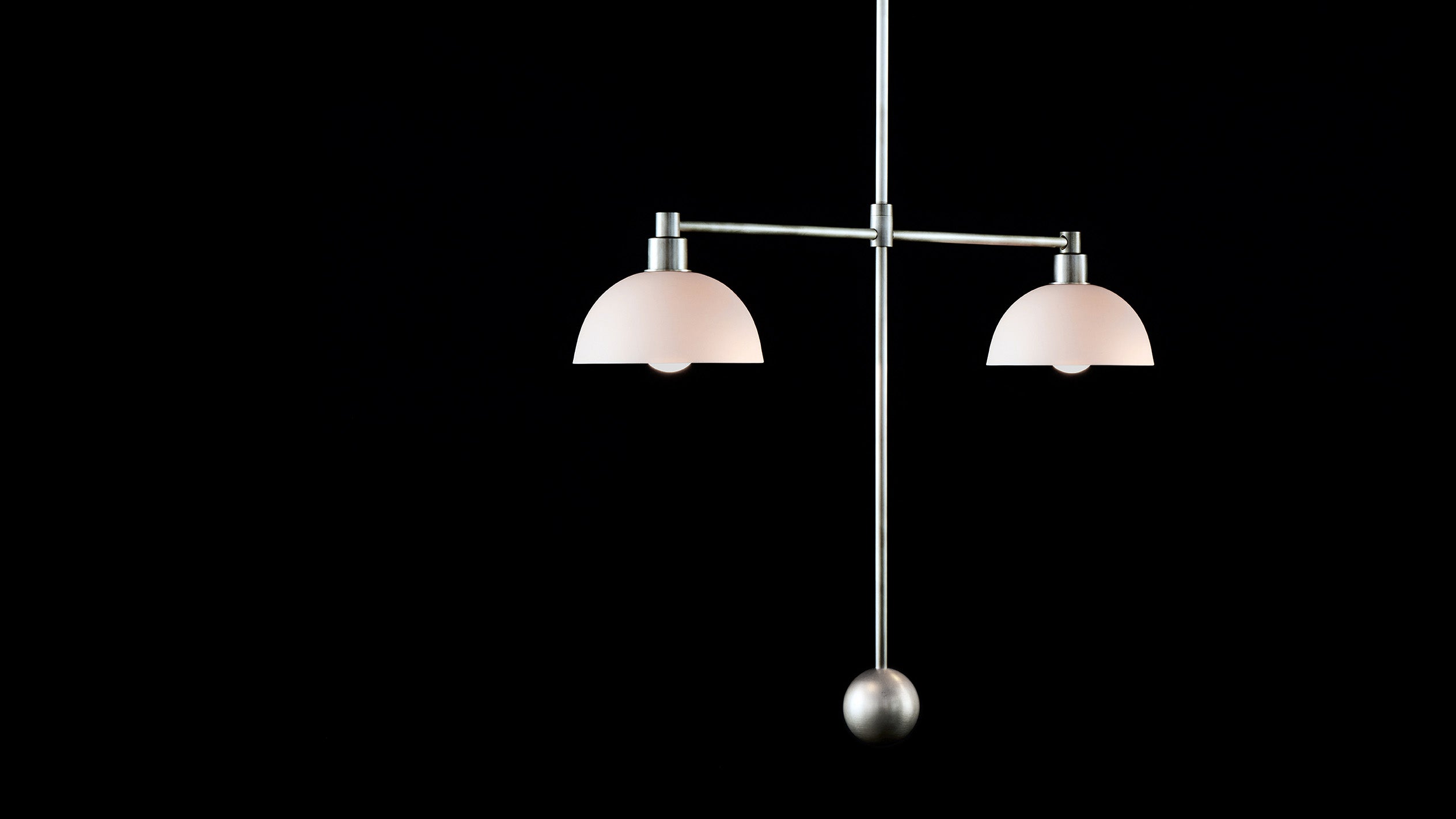 TRAPEZE : 2 MOBILE ceiling pendant in Tarnished Silver finish with porcelain bowls, hanging against a black background. 