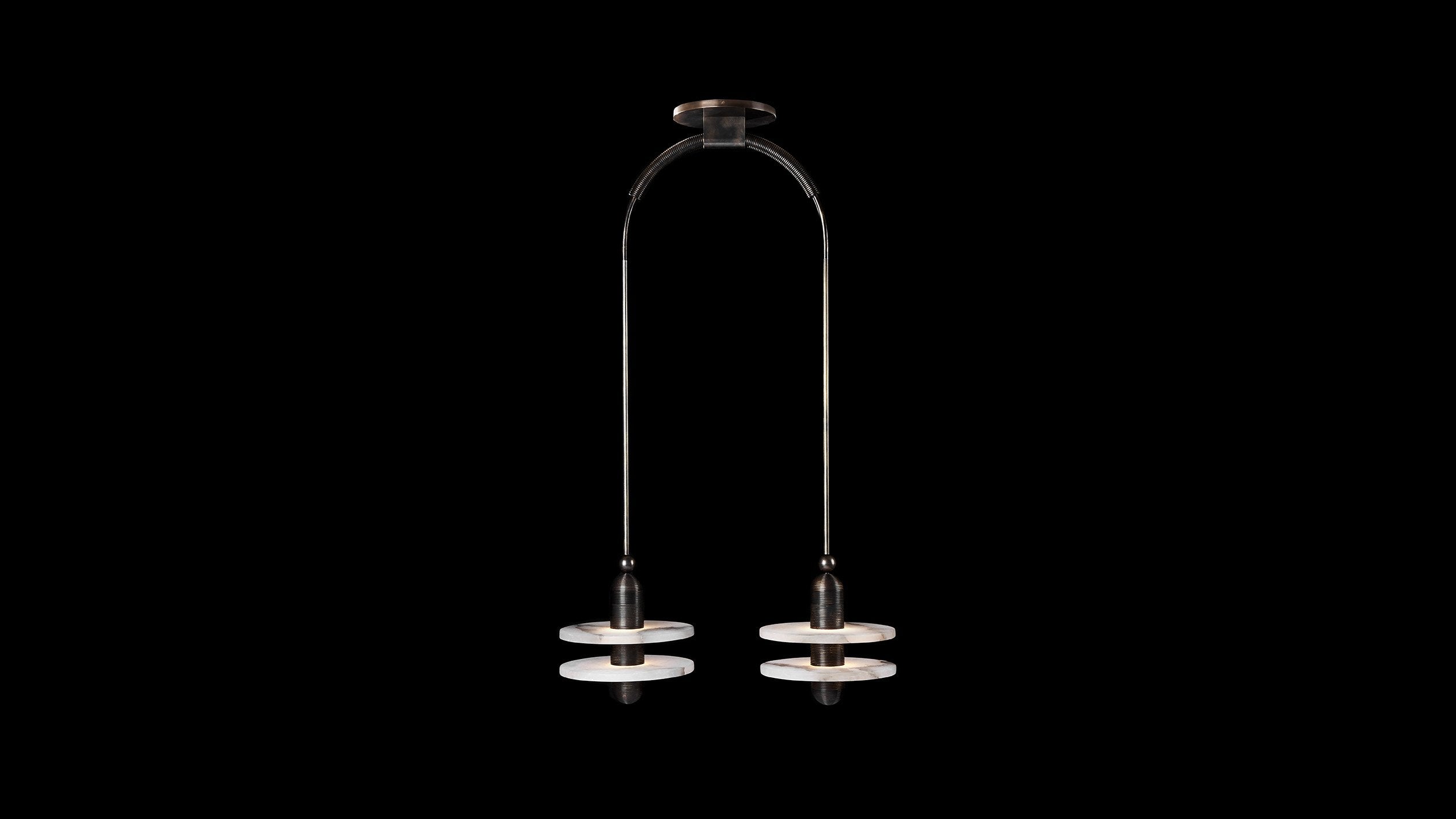 MEDIAN : 2 ceiling pendant in Oil-Rubbed Bronze finish hanging against a black background. 