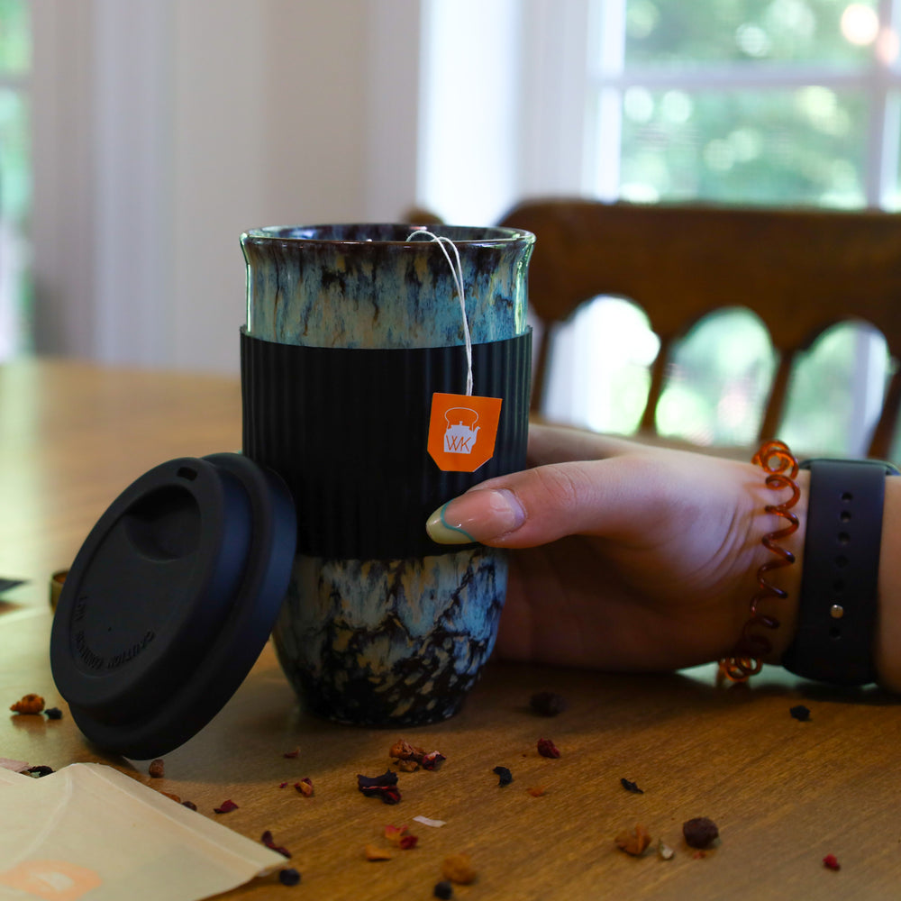 bird egg ceramic travel mug with Whistling Kettle tea bag