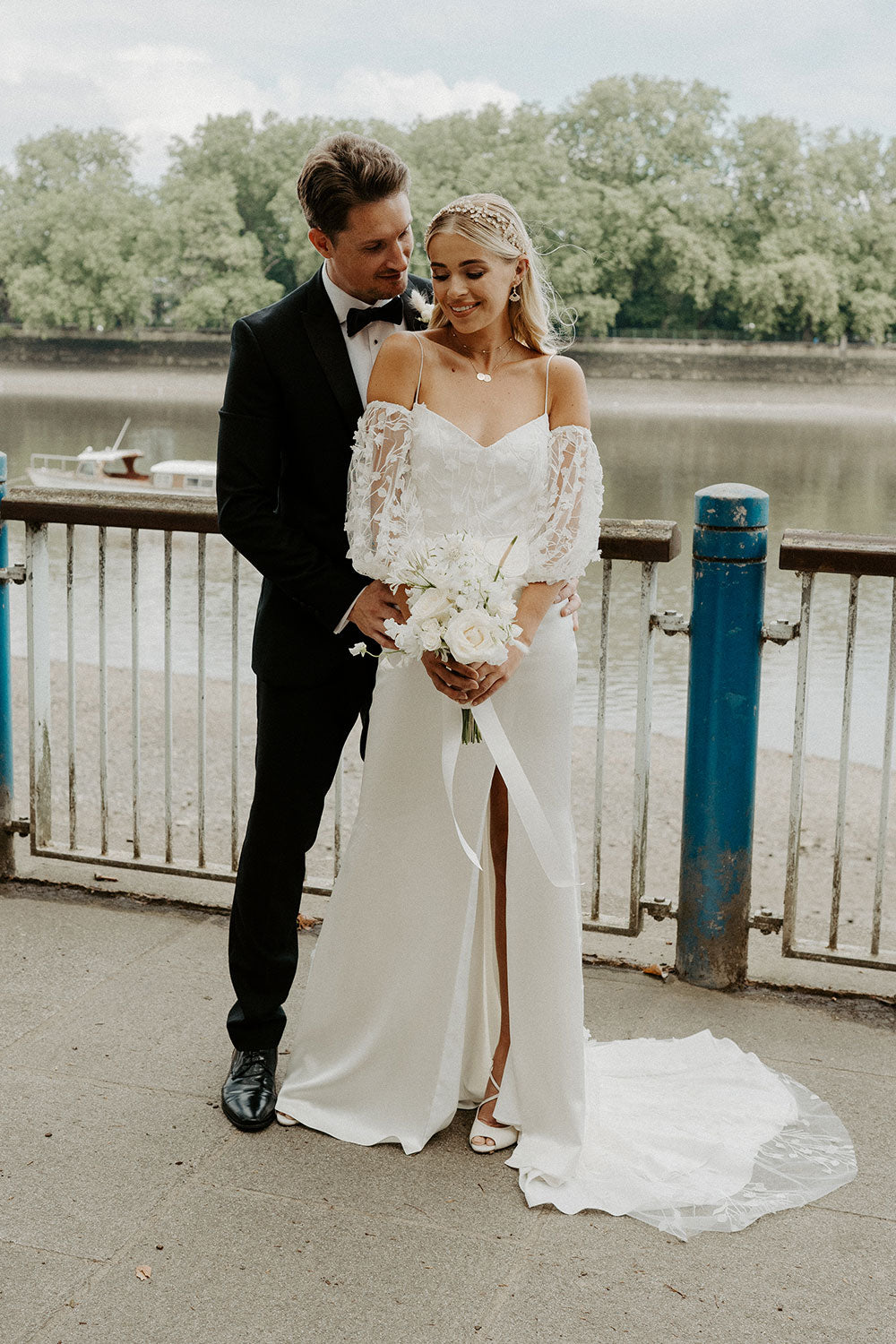 A bride wearing Constellation Ame Florence Wedding Dress