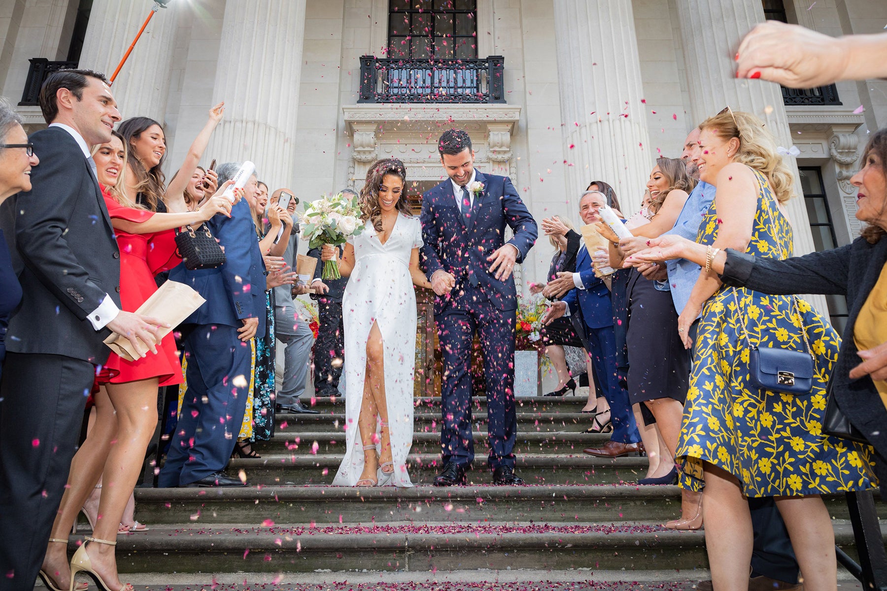 Bride Jessica in our Esmee Wedding Dress with her husband at their registry office wedding at Old Marylebone Town Hall