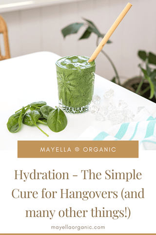pinterest image of a green smoothie on a white table with a bamboo straw. There is text that reads Hydration - The Simple Cure for Hangovers (and many other things!)