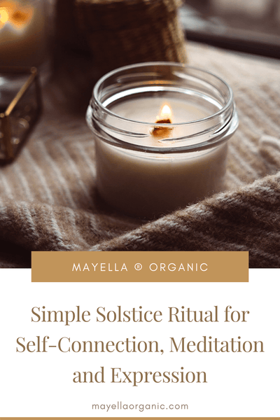 pinterest image with a photo of a small, lit candle in a jar next to text that reads: Simple Solstice Ritual for Self-Connection, Meditation and Expression