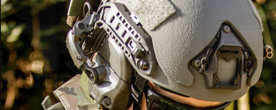 Ops-Core AMP Arms Attaching the AMP Headset to a helmet in-use by a Military person