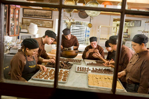 Workers at Wiseman House chocolates