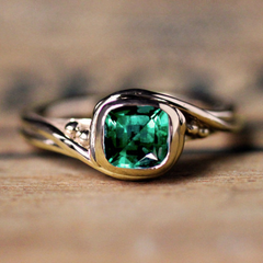 Emerald Pirouette Ring in 14k Yellow Gold