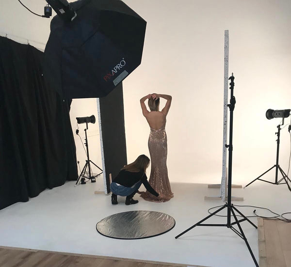 Rosie wearing gold dress by Youma Leth