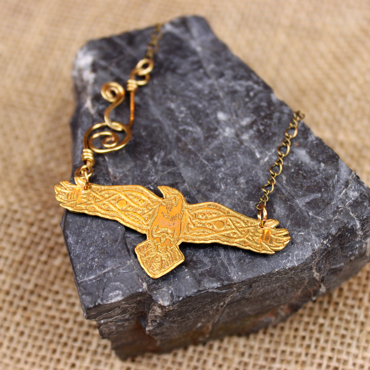 Brass raven pendant