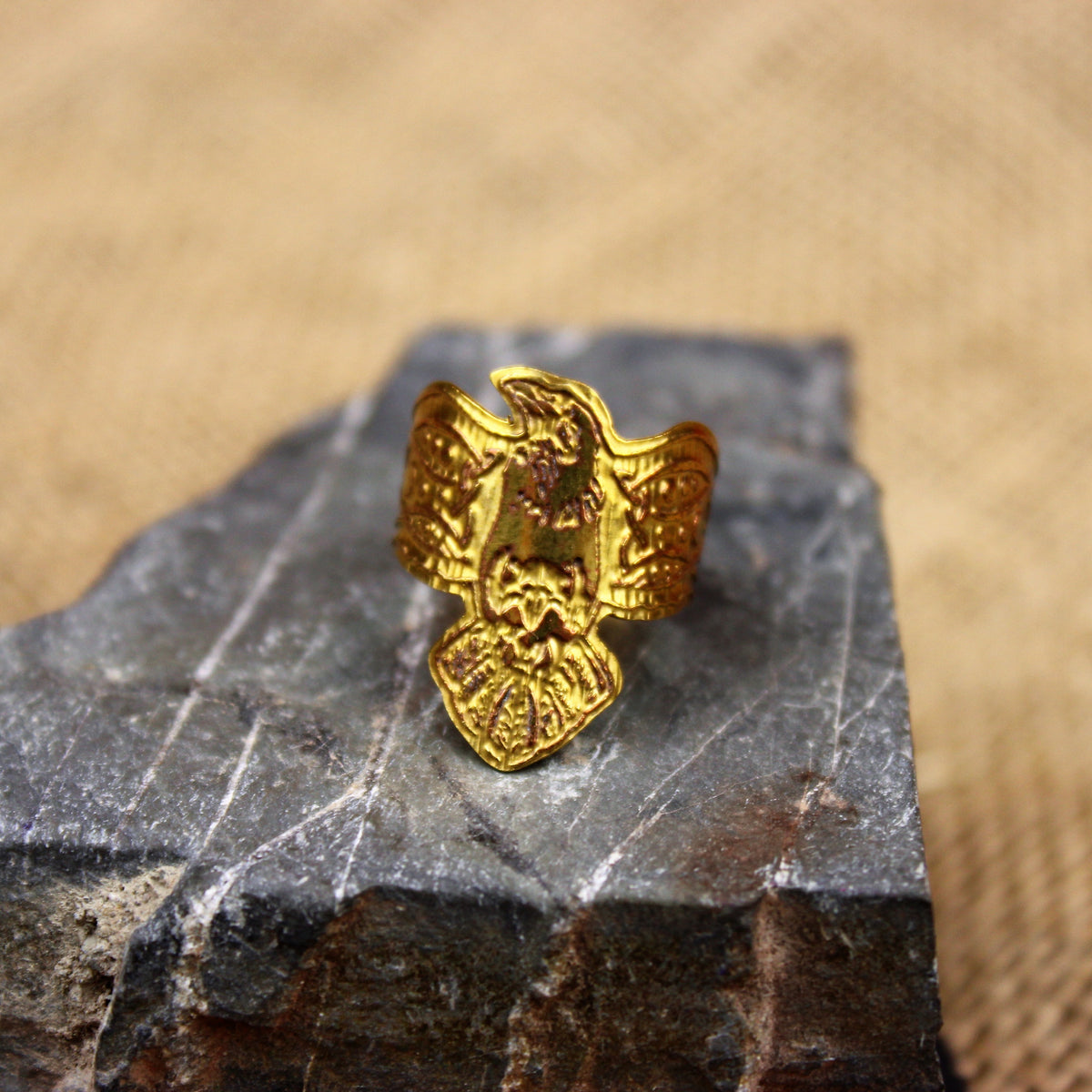 Brass raven ring cutout