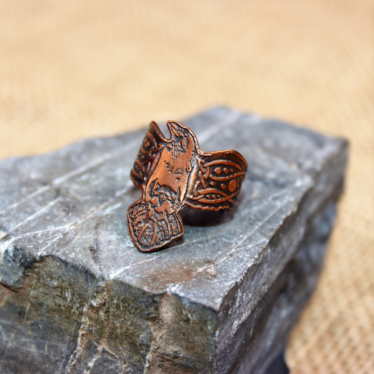 Copper raven ring cutout