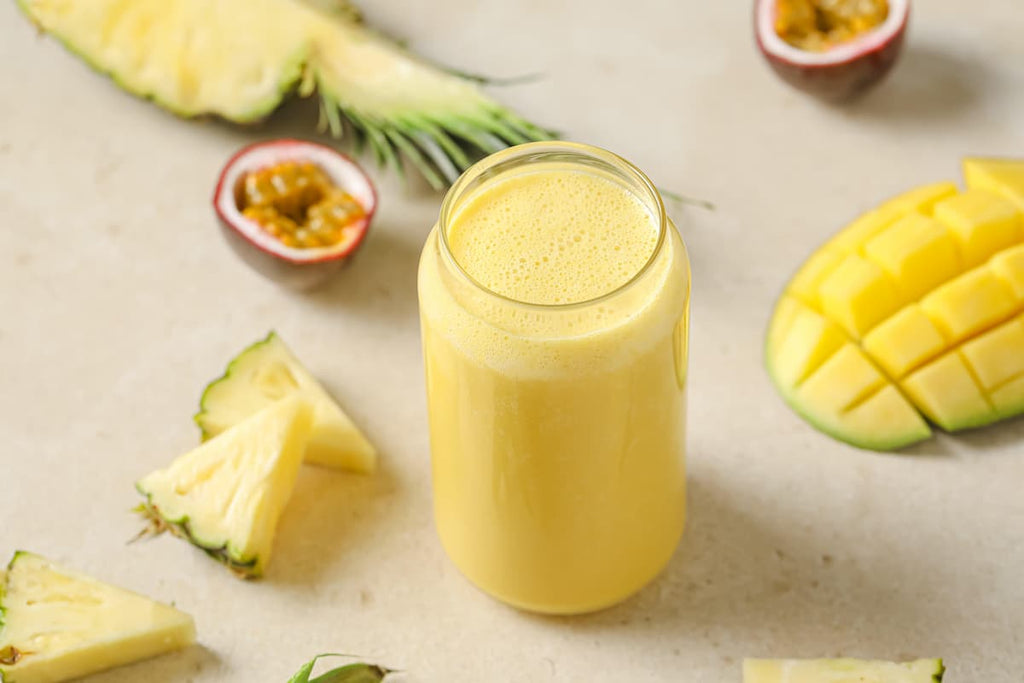 PACK'D frozen fruit in a smoothie glass