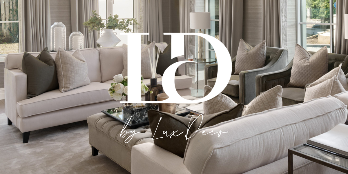 LD by LuxDeco living room with off-white sofas and buttoned-coffee table