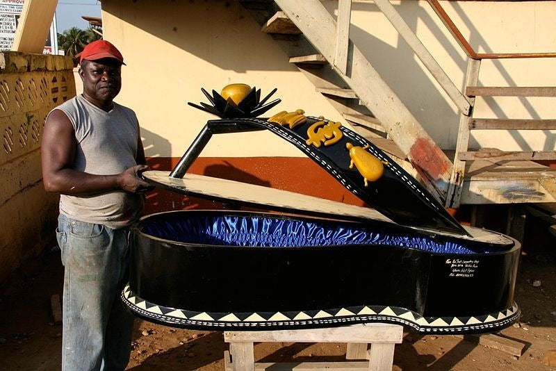 Paa Joe with a sandal coffin in collaboration with Regula Tschumi for the Kunstmuseum Berne 2006