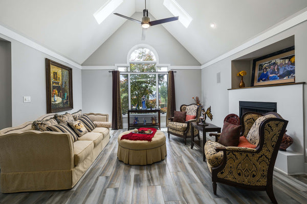 Patterned brown sofa set with a circular table at the center