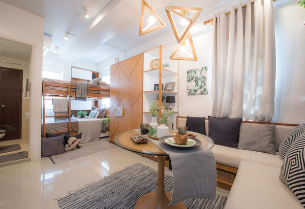 Scandinavian-themed apartment with grey corner sofa