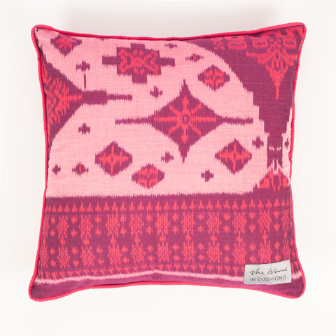 Bright pink ikat square cushion
