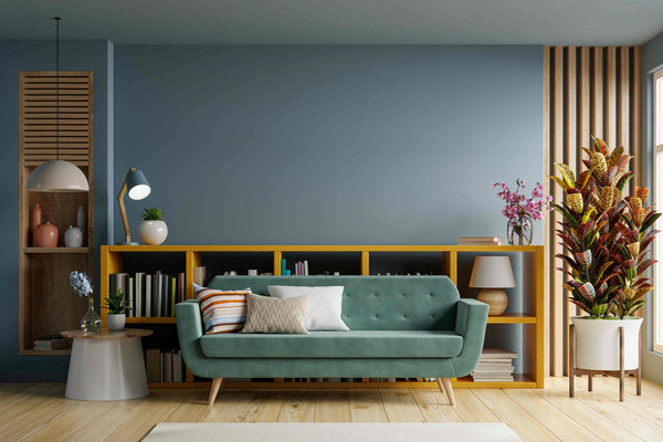 Living Room with Green Sofa on Dark Blue Wall