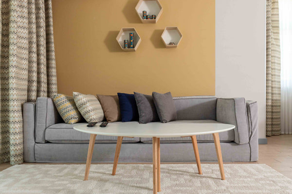 Stylish interior of modern living room with comfortable sofa