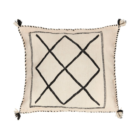 Cream square cushion with black diagonal patterns