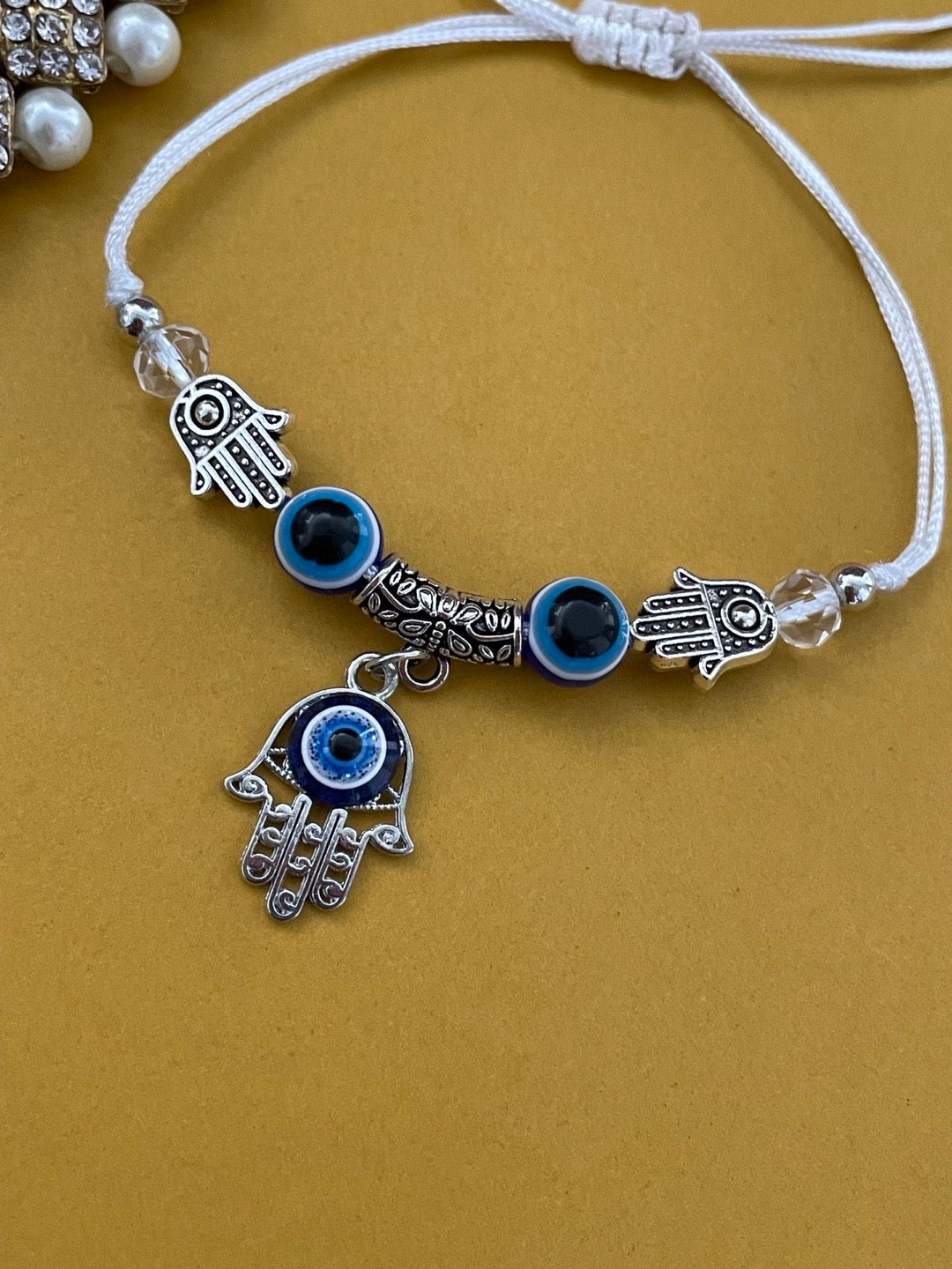 image for Silver Plated Hamsa & Blue Evil Eye Rakhi Bracelet for Raksha Bandhan