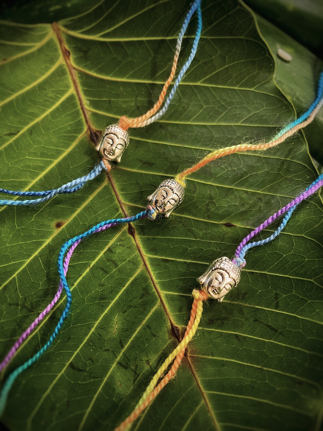 image for (COMBO of 3) German Oxidized Silver Rakhi Designs Buddha Face Multicoloured Mauli Raksha Bandhan