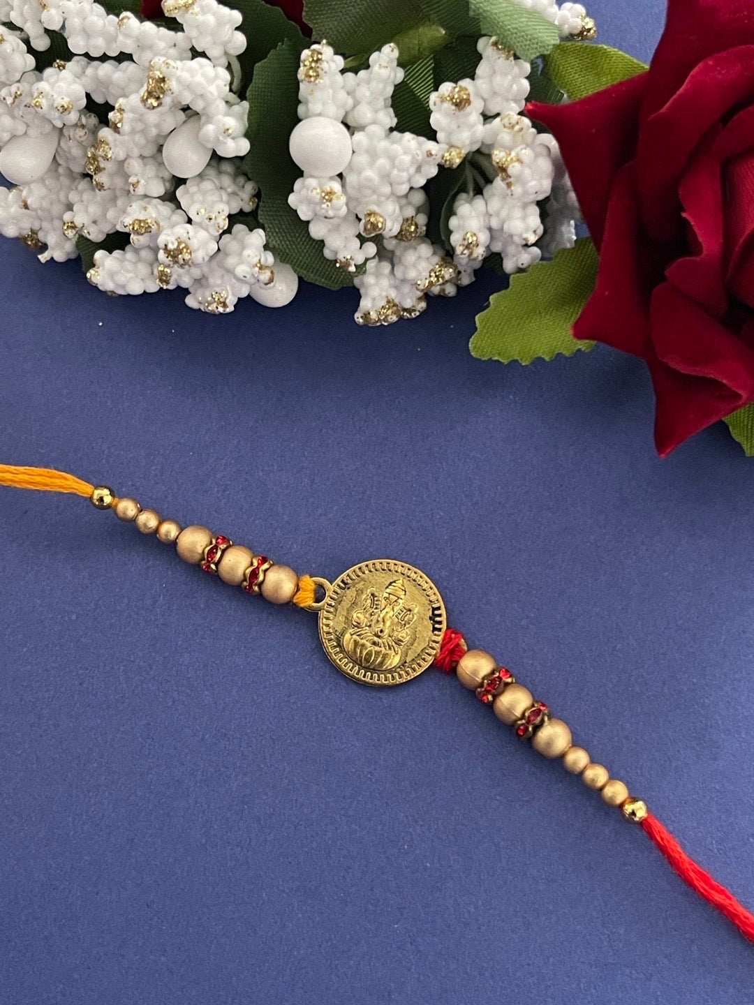 image for Fancy Rakhi Designs Ganesh Ji Pendant Cream Color Beads Multicoloured Mauli Thread Raksha Bandhan