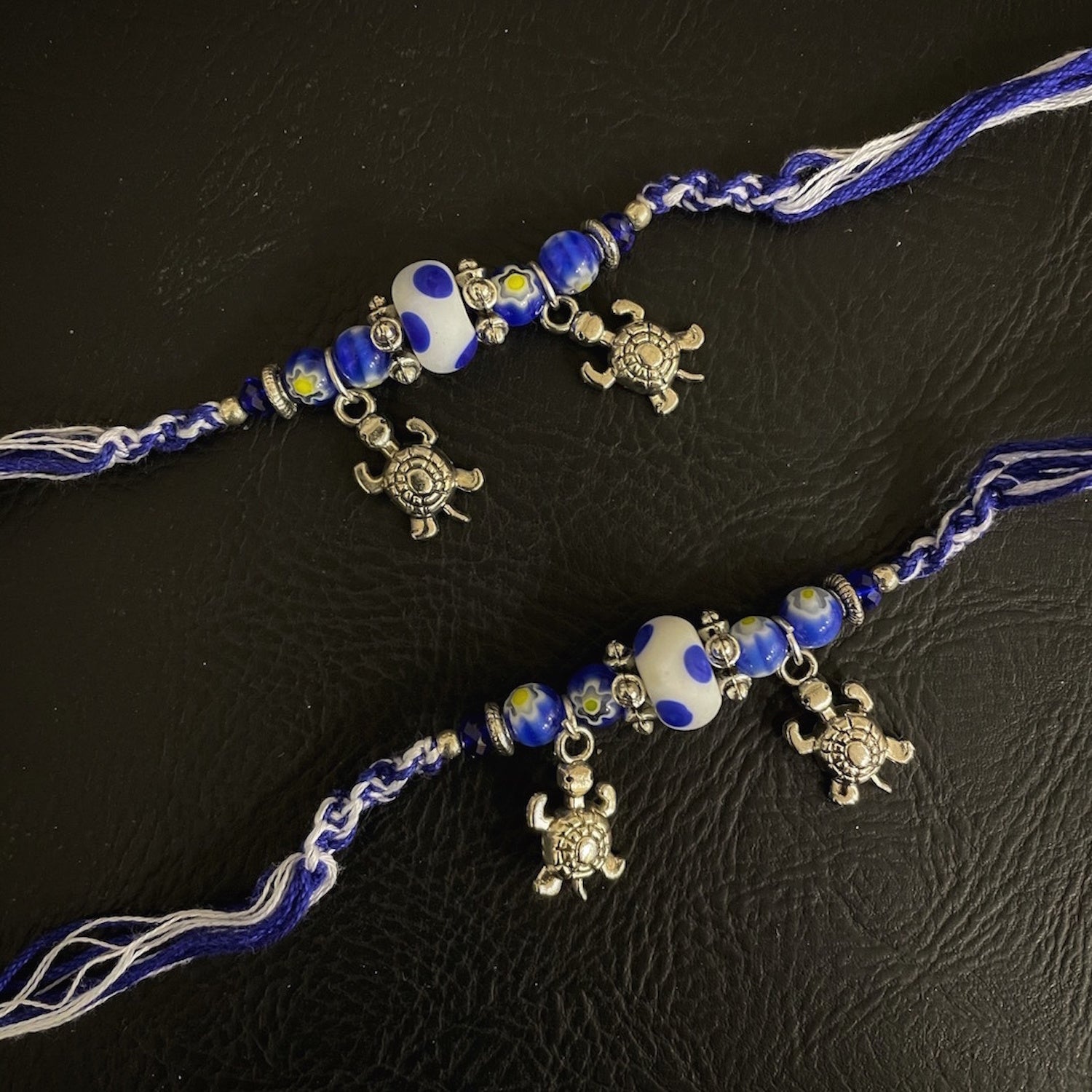 image for (Rakhi Set of 2) Designer Rakhi Blue Beads With Tortoise Charm On multicolour Thread Rakhi