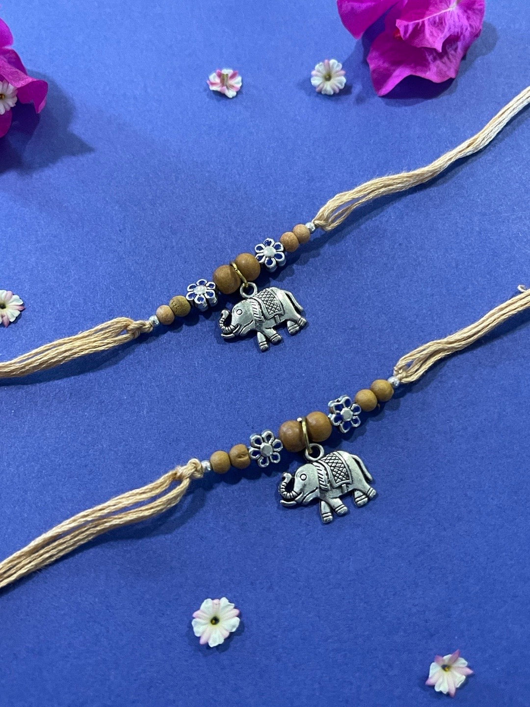 image for (Rakhi Set of 2) Beautiful Designer Chandan Rakhi Flower Designs With Elephant Charm Thread Rakhi