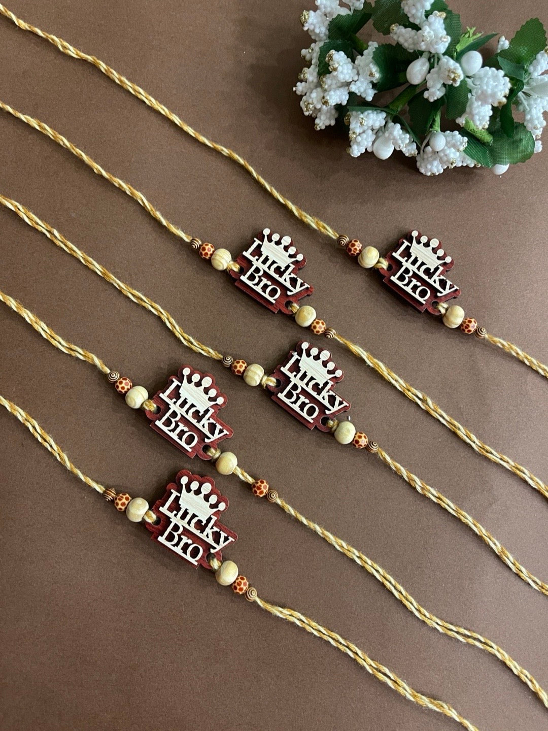 image for (Combo of 5) Unique Lucky Bro MDF Wooden Rakhi With Beads multicolour Thread Rakhi For Raksha Bandhan