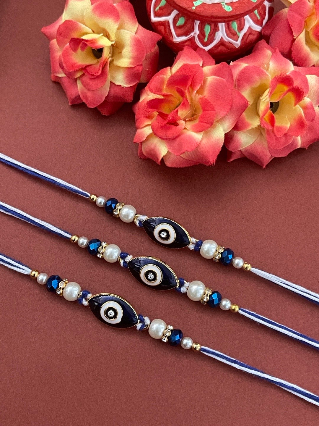 image for (Rakhi Set of 3) Designer Navy Blue Evil Eye Rakhi With Moti And Crystal Beads Thread Rakhi