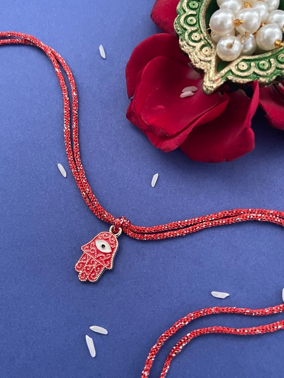 image for Fancy Designer Rakhi Red Evil Eye Hamsa With Thread Rakhi For Raksha Bandhan