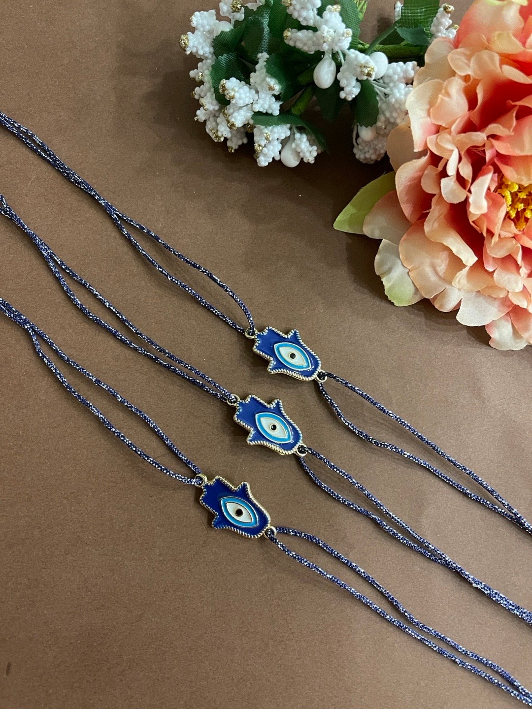 image for (Rakhi Set of 3) Designer Rakhi Blue Evil Eye Hamsa Beautiful Thread Rakhi For Raksha Bandhan