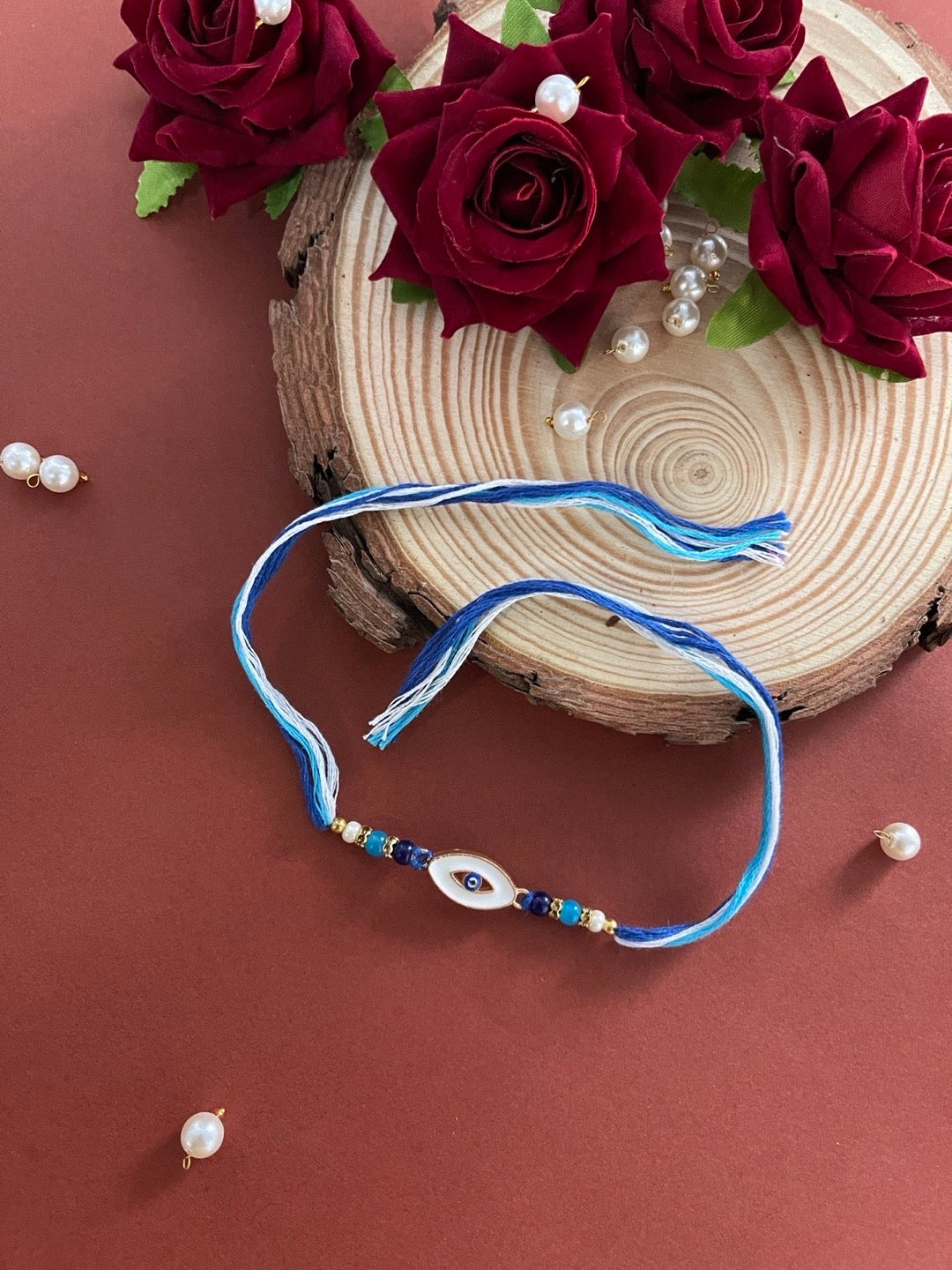 image for Beautiful Designer Blue Evil Eye Rakhi With Multicolor Beads Thread Rakhi For Raksha Bandhan