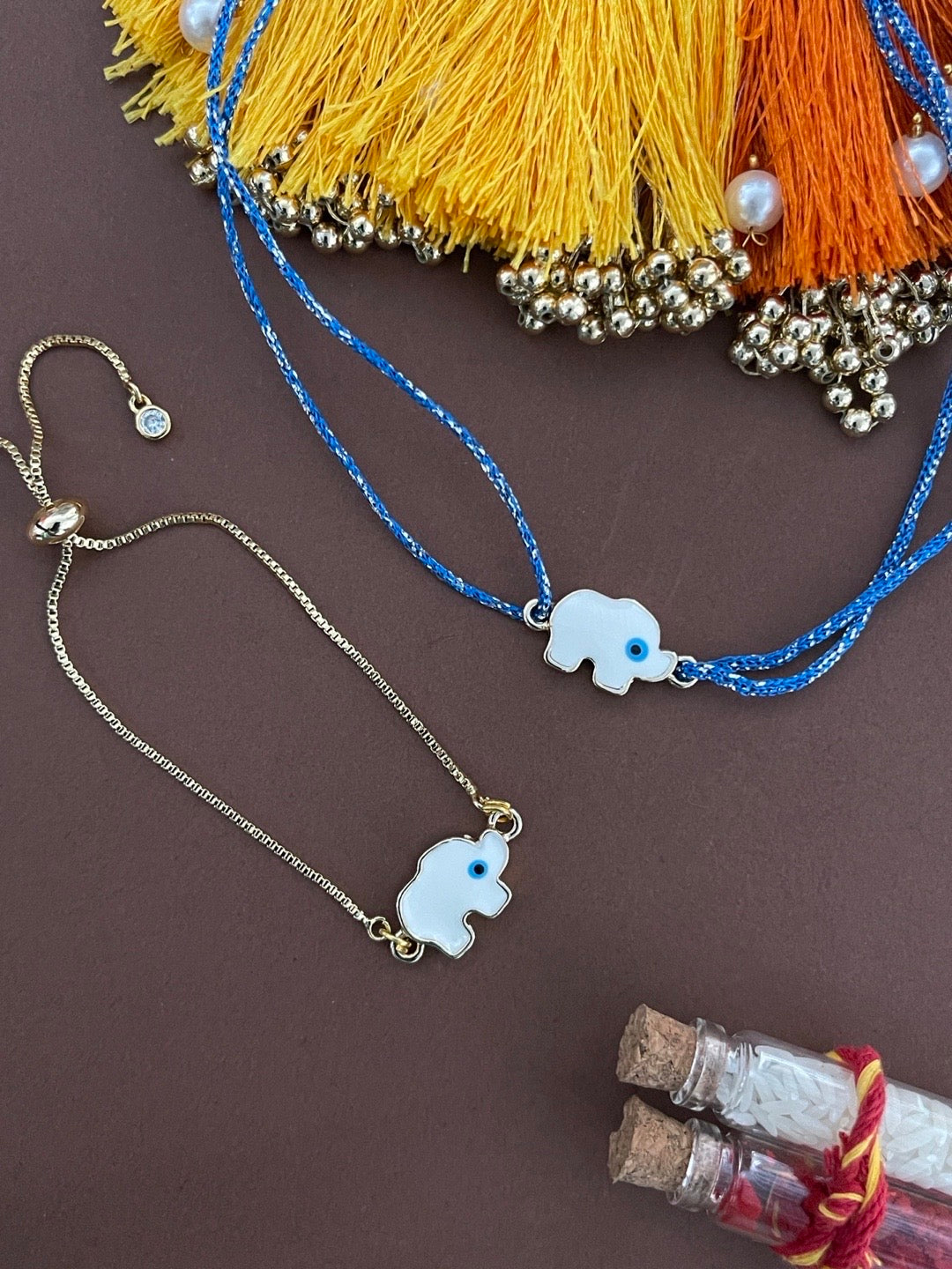 image for (Combo of 2) Gold Plated White Elephant Enamel Evil Eye Bracelet & Rakhi Thread For Rakshabandhan