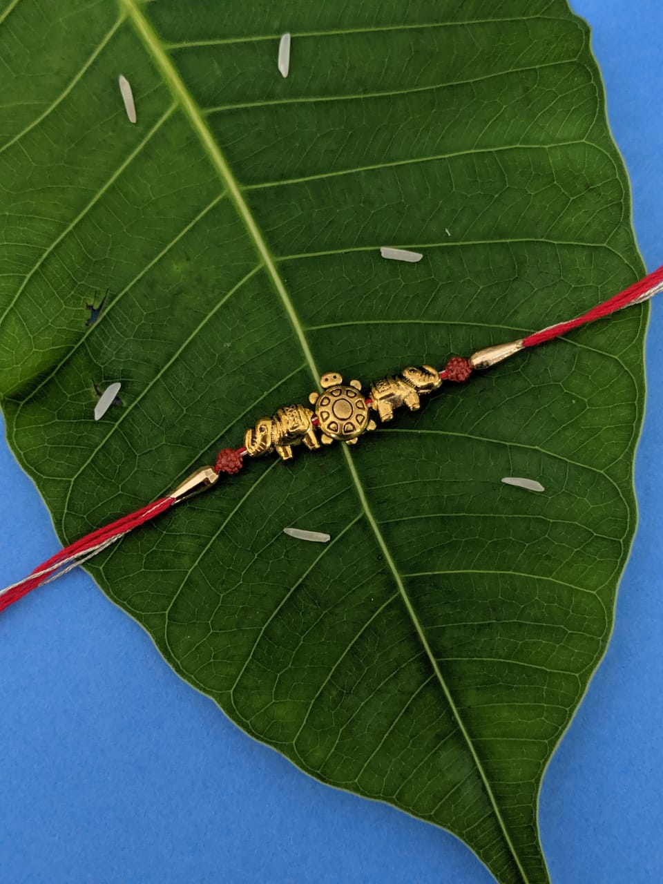 image for Latest Rakhi Design Gold Plated Tortoise/Elephant with Rudraksha Beads Pendant Mauli Raksha Bandhan