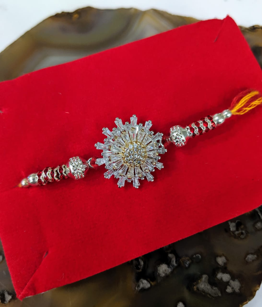 image for Silver Rakhi With American Diamond Red Stone Beads Multicolor Thread Fancy Rakhi For Men