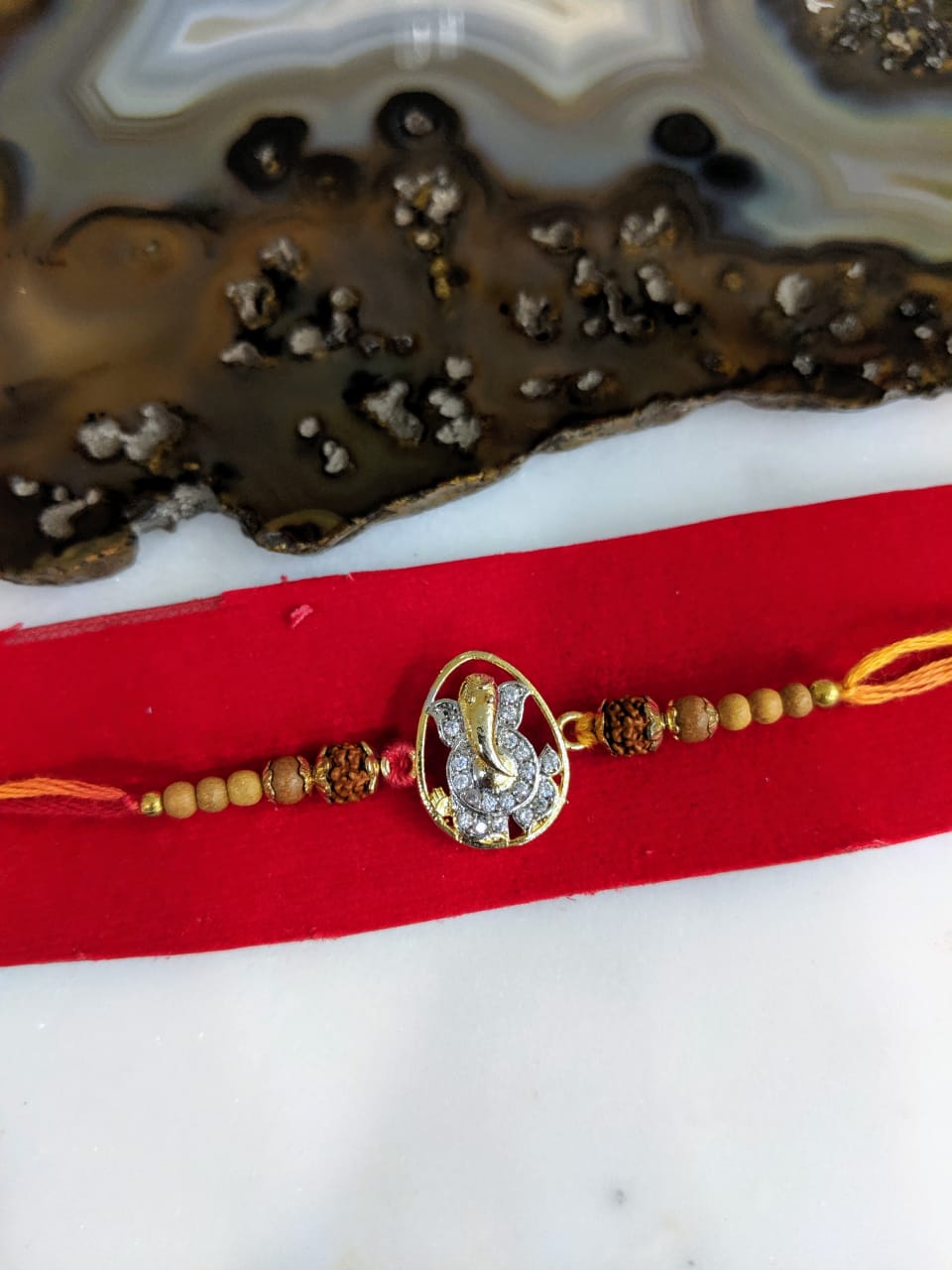 image for Gold Plated Rakhi with American Diamond Ganesh Ji Designer Rudraksha Beads Thread Rakhi