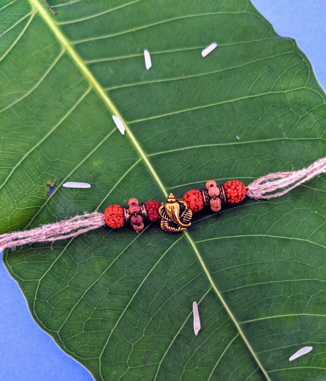 image for Trendy Rakhi Design Ganesha with Rudraksha/Tulsi Beads Pendant Mauli Thread For Raksha Bandhan