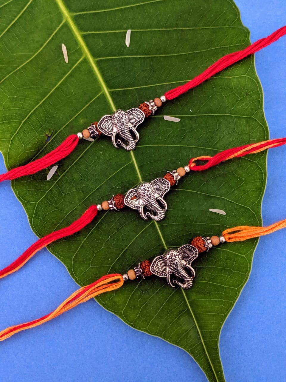 image for (Set of 3) Designer Rakhi with Silver Plated Ganpati Bappa Rudraksha Tulsi Beads Thread Rakhi