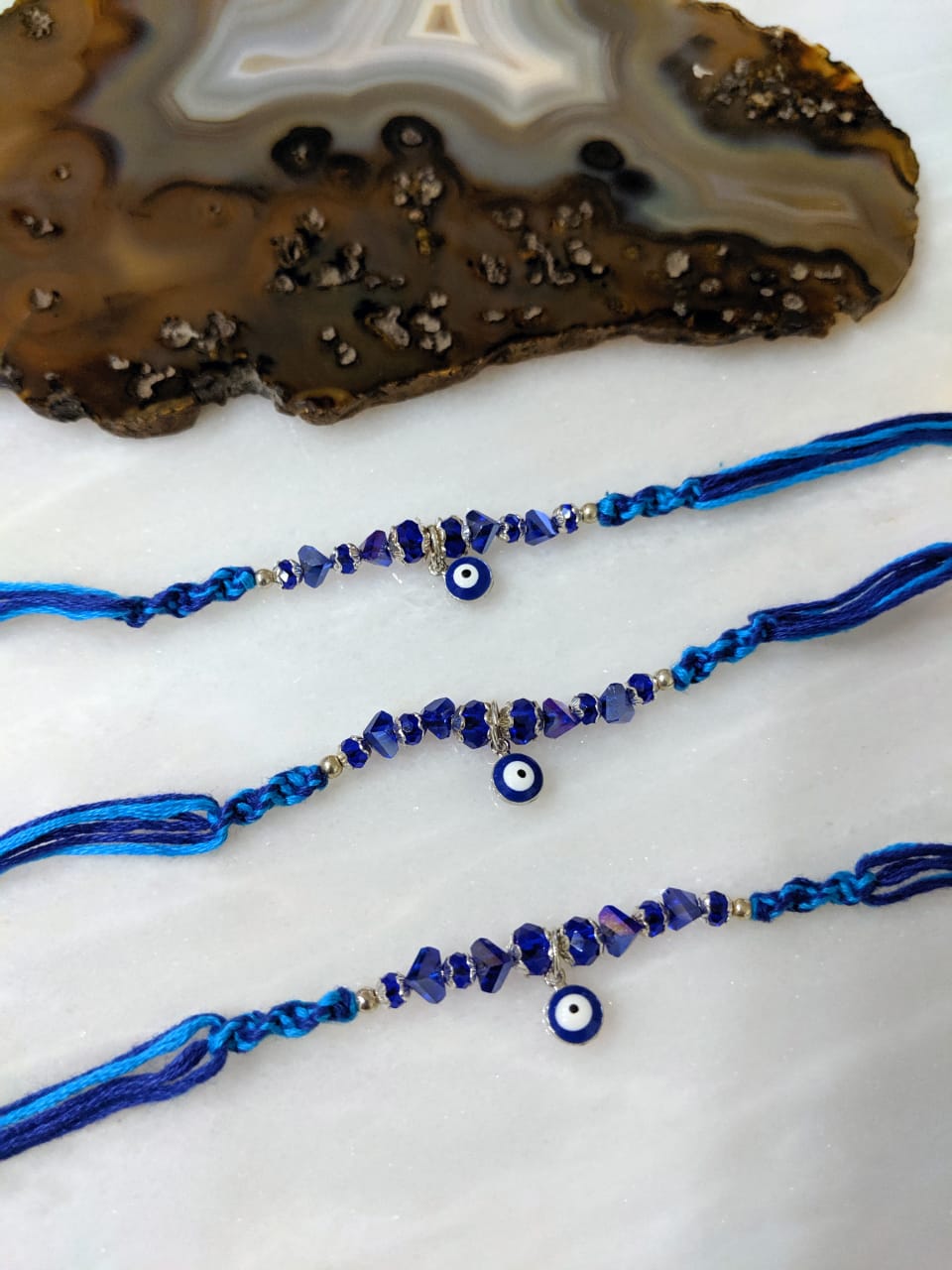 image for (Set of 3) Navy Blue Evil Eye Rakhi for Men Blue Beads Multicolor Thread Rakhi