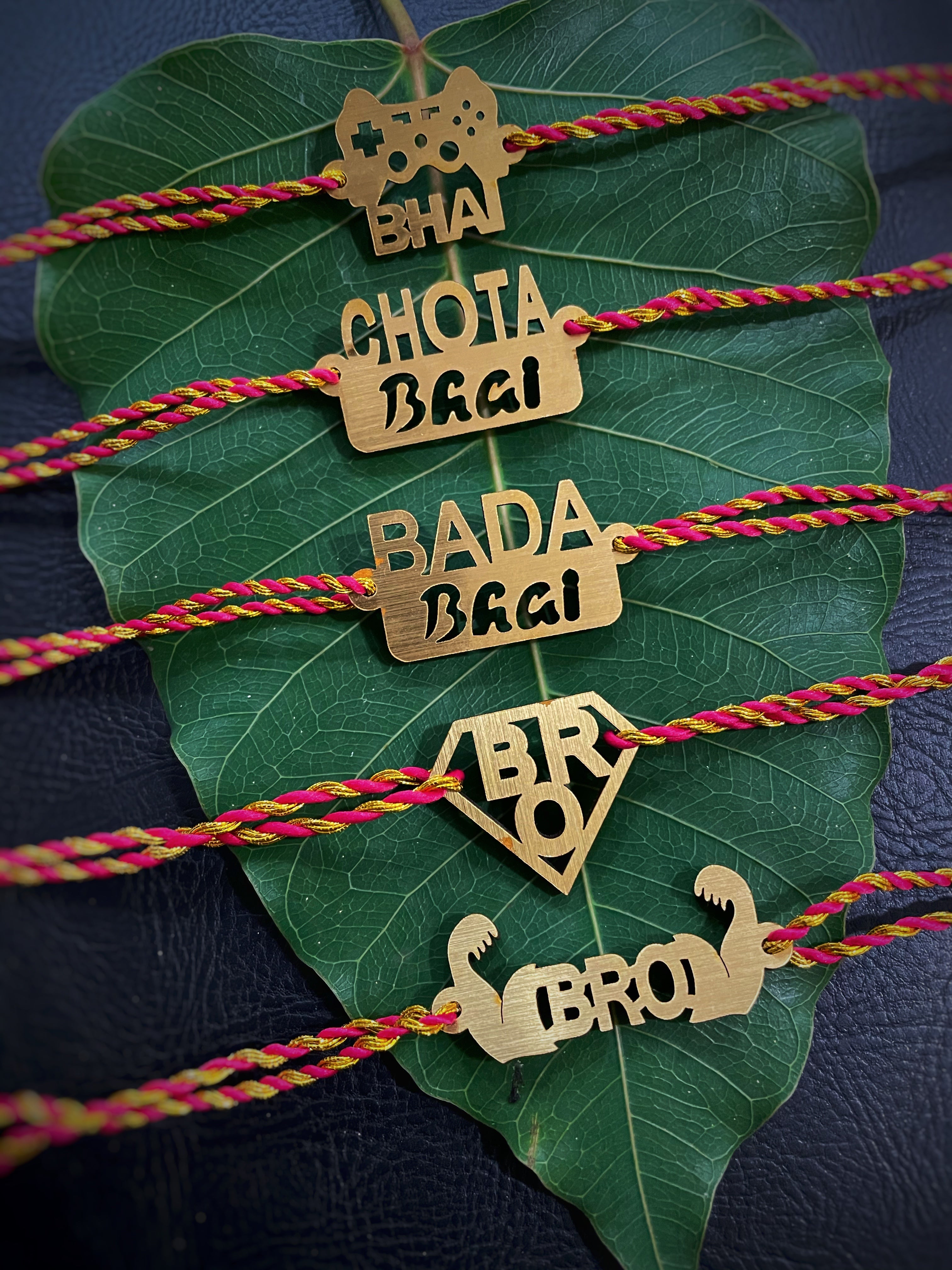 image for (COMBO of 5) Fancy Rakhi Designs With Funky Slogan of Bhai/BRO Red Yellow Mauli Raksha Bandhan