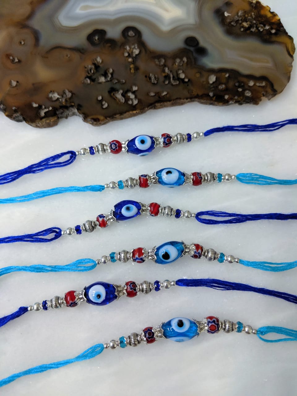 image for (Set of 6) Evil Eye Rakhi for Men Silver Blue Beads Multicolor Thread Rakhi