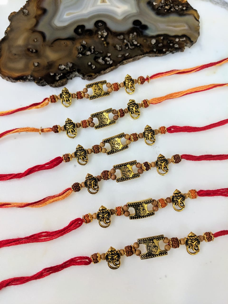 image for (Set of 6) Ganesh Ji Rudraksha Rakhi for Men Gold Plated Beads Rakhi