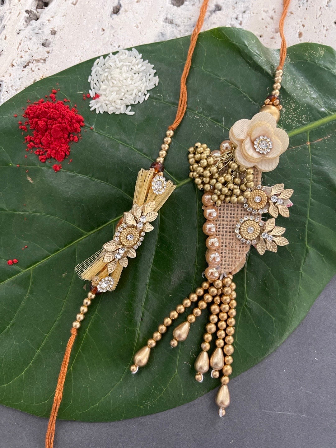 image for (Set of 2) Designer Rakhi Lumba Set With Floral/Beads/Pearl Design Rakhi For Brother And Bhabhi