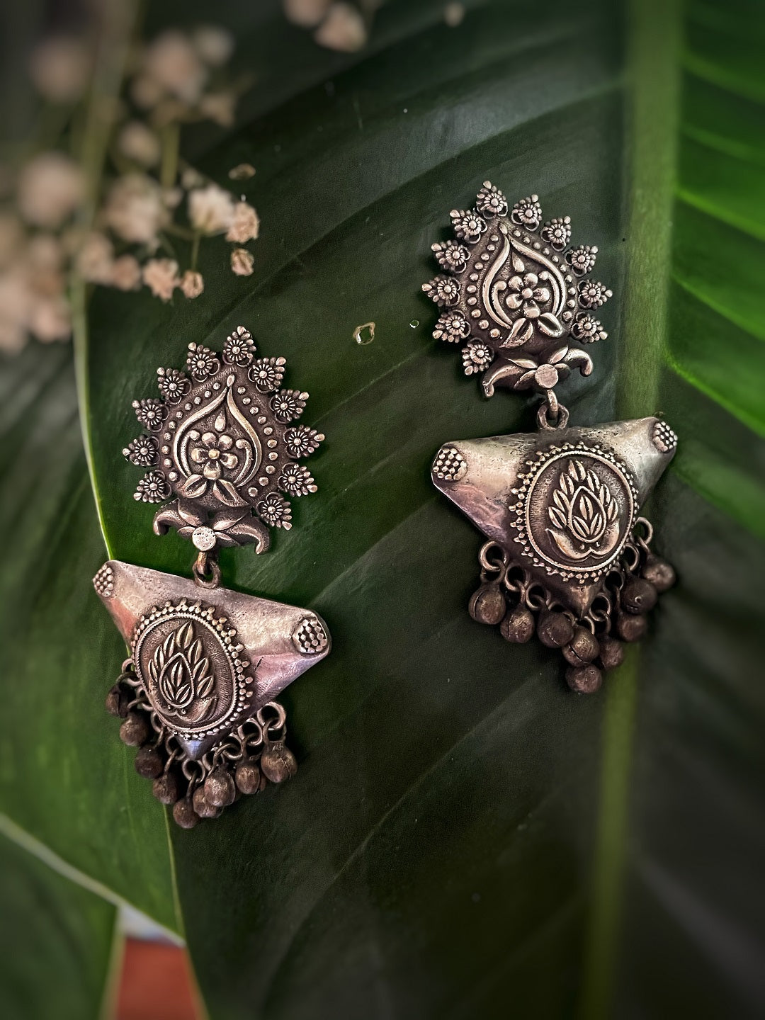 image for German Silver Oxidized Earrings Antique Floral/Leafy Armed Shield Design Engraved Gungroo Danglers